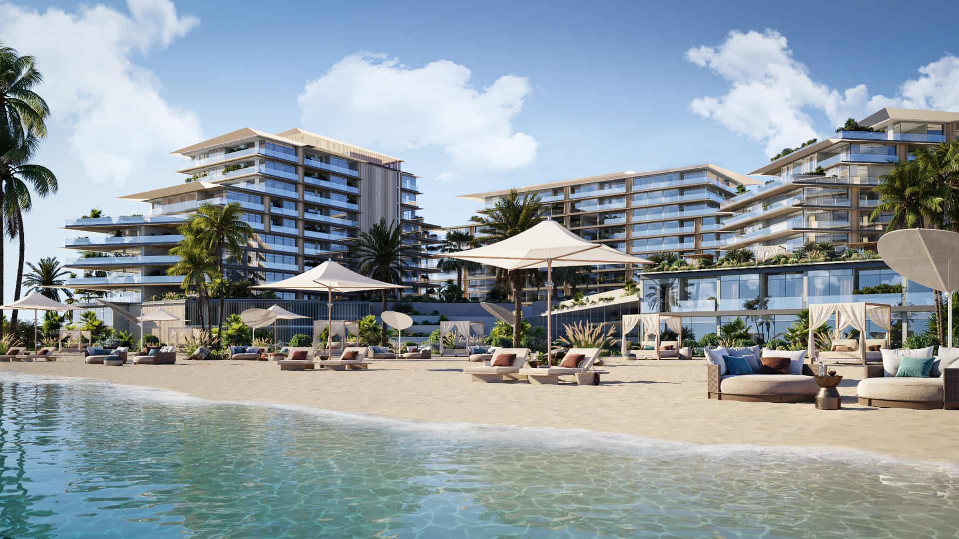 Luxurious beachfront residential towers in Dubai with outdoor lounging and swimming pool amenities.