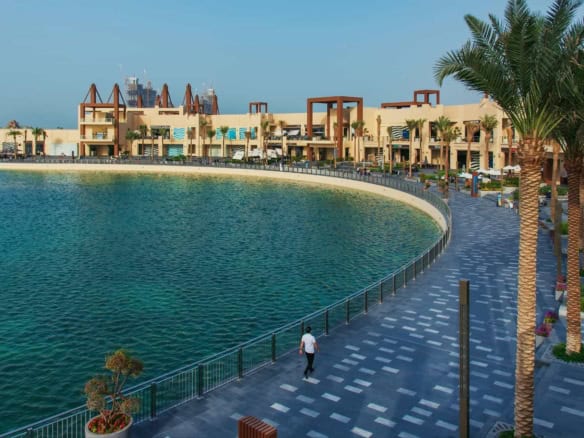 Waterfront Living Compared- Abu Dhabi's Islands vs. Dubai's Palm & Marina (2026 Price Guide)