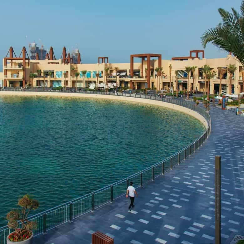 Waterfront Living Compared: Abu Dhabi’s Islands vs. Dubai’s Palm & Marina (2026 Price Guide)