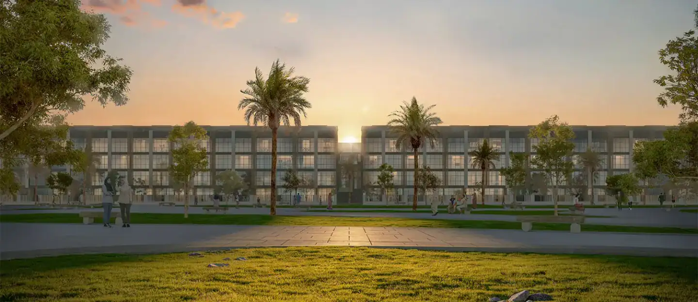Reportage Village Khalifa City, townhouses across the community park at sunset