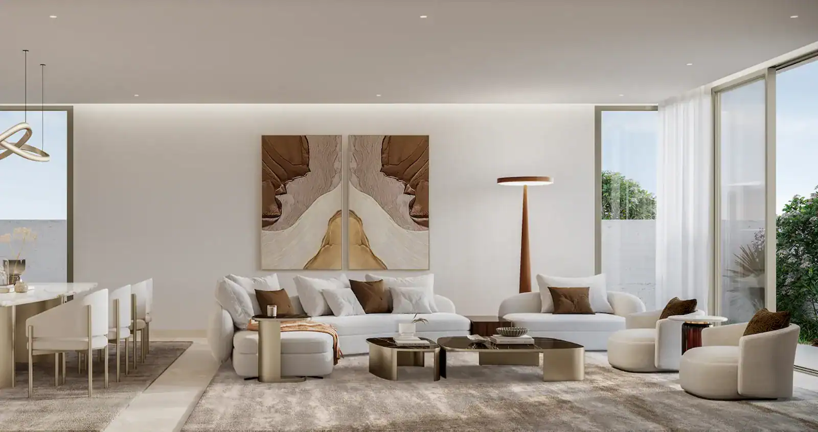 Living and dining area interior in a Talay villa by Aldar